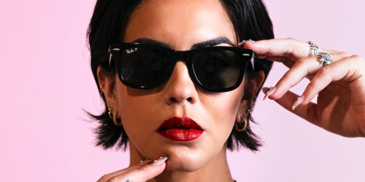 Actress and producer Katie Maloney was seen wearing black Ray-Ban Wayfarer 2140 901/58 Polarised sunglasses in her Instagram post, November 2023.