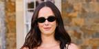 Kaya Scodelario was seen wearing black Miu Miu MU 04ZS 1AB5S0 sunglasses at a special celebration for the RH global design collaboration with Mercedes-AMG Petronas Formula One Team, July 2026