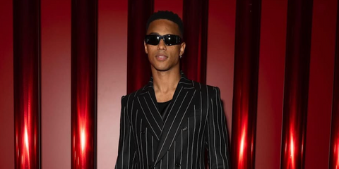 Keith Powers is seen wearing Dolce&Gabbana DG4453 501/87 rectangle sunglasses to attend the brand's Spring/Summer 2025 menswear fashion show in Milan