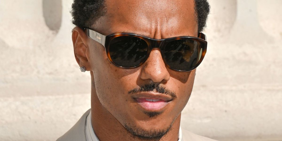 Keith Powers was seen wearing tortoiseshell Saint Laurent SL 798 Maxime 003 sunglasses at the Saint Laurent Menswear Spring/Summer 2026 fashion show during Paris Men's Fashion Week