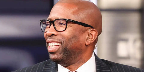 Kenny Smith was seen wearing black Tom Ford TF5818-B 001 Blue Control optical glasses in a TV show