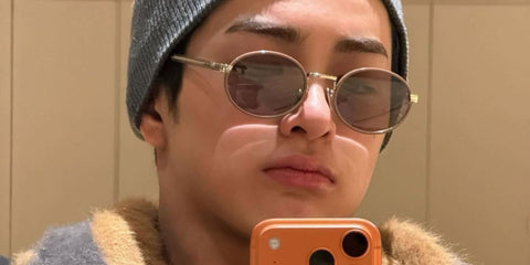 South Korean singer Keonho of boy band Cortis was seen wearing pecan Prada PR B56S 24E20I oval round sunglasses in a social media post