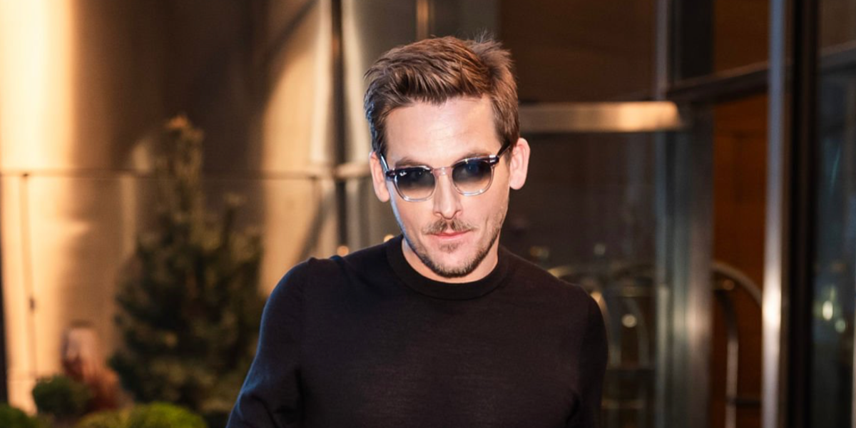 Canadian actor Kevin Zegers was seen wearing transparent Ray-Ban Hawkeye RB 2298 1355/3F sunglasses with grey gradient lenses in New York City, March 2026.