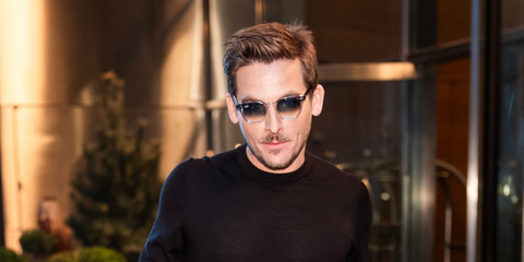 Canadian actor Kevin Zegers was seen wearing transparent Ray-Ban Hawkeye RB 2298 1355/3F sunglasses with grey gradient lenses in New York City, March 2026.