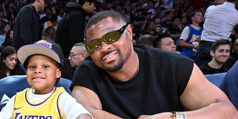 American football player Khalil Mack was seen wearing black and white Prada PR 06YS 09Q5S0 sunglasses at an NBA game game between the Los Angeles Lakers and the Chicago Bulls in March 2026.
