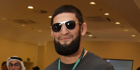 Russian-Emirati mixed martial artist Khamzat Chimaev was seen wearing gold and silver Cartier CT0532S 004 sunglasses with brown lenses at the F1 Grand Prix of Abu Dhabi 2025.
