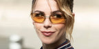 Kiernan Shipka is seen wearing Miu Miu MU A50S 5AK7R1 sunglasses to attend the brand's Spring/Summer 2025 fashion show in Paris