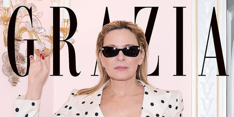 Kim Cattrall was seen wearing black Swarovski SK6033 1001/87 sunglasses on the cover of Grazia UK magazine, May 2025.