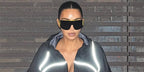 Kim Kardashian was seen wearing black and yellow Loewe Signature LW40202U 02A Speed Shield sunglasses at Scott Disick's birthday party in Malibu, May 2026.