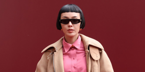 Taiwanese fashion influencer Kiwi Lee Han was seen wearing black Gucci GG1771S 001 sunglasses at the Gucci Spring/Summer 2025 fashion show during Milan Fashion Week. Shop online now on Pretavoir