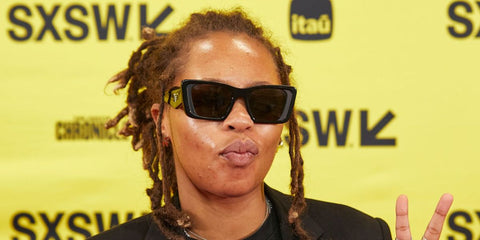 Rapper and singer Kodie Shane was seen wearing black Prada PR 08YS 1AB5S0 Symbole Sunglasses at the SXSW 2024 Conference and Festivals in Austin, Texas.