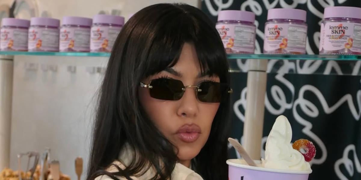 Kourtney Kardashian was seen wearing gold Miu Miu MU B50S 26C09Z sunglasses with dark brown lenses in Lemme Skin x Mimi's Frozen Yogurt collaboration activation, shared through her Instagram post in July 2026.
