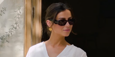 Television personality Kristina Schulman of The Bachelor and Bachelor In Paradise was seen wearing black Prada PR 17WS 1AB5S0 Symbole Sunglasses in her Instagram post, June 2024.