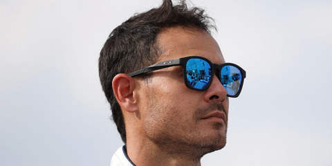 American racer Kyle Larson was seen wearing black Oakley Shackle OO9507D 01 sunglasses with Prizm Sapphire lenses at NASCAR Cup Series eero 400 in Illinois, July 2026