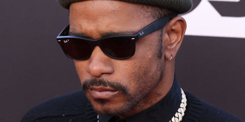 LaKeith Stanfield was seen wearing black rubber Ray-Ban New Wayfarer RB 2132 622/58 sunglasses with green Polarised lenses to attend the 27th Annual Ciritcs Choice Awards in Los Angeles