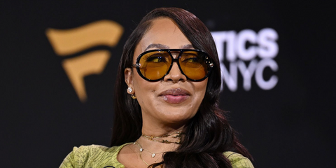 La La Anthony was seen wearing black Bottega Veneta BV1273S 003 Drop Aviator sunglasses with yellow lenses at Fanatics Fest 2026 in New York City.