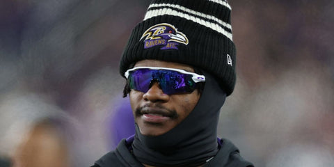 Lamar Jackson is seen wearing Oakley Radar EV Path OO9208 47 Prizm sunglasses