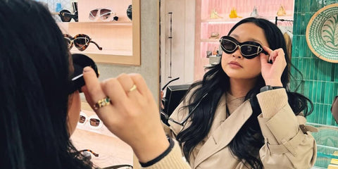 Lana Condor is seen wearing black and gold Loewe Double Frame LW40119I 01A sunglasses in her Instagram post