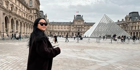 Lana Condor is seen wearing Saint Laurent Sun SL 214 Kate 001 cat eye sunglasses in her Instagram post