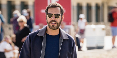 French actor and director Laurent Lafitte was seen wearing the iconic Ray-Ban Clubmaster 3016 W0365 Black half-rim sunglasses at the 47th Deauville American Film Festival in France