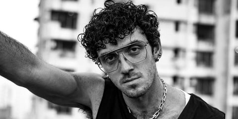 Lauv was seen wearing gold Bottega Veneta BV1012S 009 aviator sunglasses with clear lenses in his Instagram post