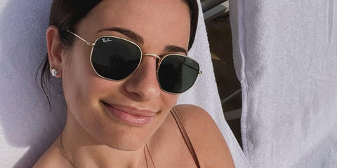 Lea Michele is seen wearing Ray-Ban RB 3548N 001 Hexagonal Gold With Flat Lenses sunglasses in her Instagram post