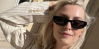 German model Lena Gercke was seen wearing black Saint Laurent Sun SL M126 001 sunglasses in her Instagram post, August 2025.