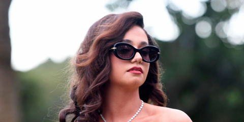 Lena Mahfouf, also known as Lena Situations, was seen wearing black Hugo Boss 1521/S 807IR oval sunglasses at the 2025 Cannes Film Festival