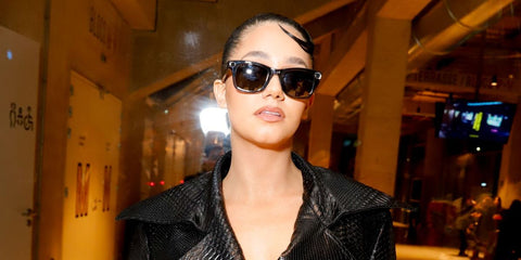 French influencer Lena Mahfouf also known as Lena Situations was seen wearing Ray-Ban Meta x Coperni Wayfarer RW4006S 66506G Limited Edition smart glasses at the Coperni Fall/Winter 2025 fashion show during Paris Fashion Week