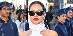 French influencer Lena Mahfouf, also known as Lena Situations, was seen wearing black Saint Laurent Sun SL 276 Mica 001 sunglasses at the Vogue World 2024 in Paris