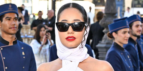 French influencer Lena Mahfouf, also known as Lena Situations, was seen wearing black Saint Laurent Sun SL 276 Mica 001 sunglasses at the Vogue World 2024 in Paris