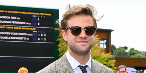 Leo Woodall is wearing Polo Ralph Lauren PH4217 6137/73 Clubmaster Style Sunglasses in Borwn Havana with Brown Lenses at Wimbledon 2024