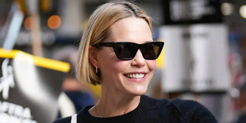 Leslie Bibb was seen wearing shiny black Saint Laurent Sun SL 276 Mica 032 sunglasses during SAG-AFTRA strike in New York