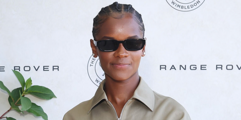 Letitia Wright was seen wearing black Prada PR B06S 16K08Z sunglasses at the Wimbledon Tennis Championships 2026 Final