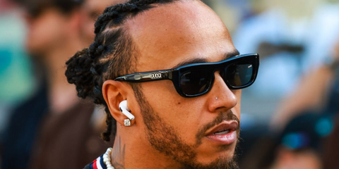 Lewis Hamilton wears Gucci GG1777S 001 black sunglasses at Formula 1 Grand Prix in Abu Dhabi 2024.