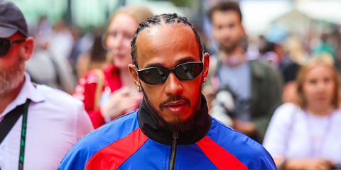 Lewis Hamilton was seen wearing black Ray-Ban RB 4457D 6677/87 sunglasses with dark grey lenses at the F1 Great Britain Grand Prix 2025. Shop online now on Pretavoir