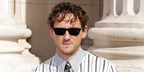 Lewis Pullman was seen wearing black Saint Laurent Sun SL 890 Betty Thin 001 sunglasses at the Saint Laurent Menswear Spring/Summer 2027 fashion show during Paris Men's Fashion Week.