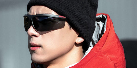 Chinese actor Li Xian was seen wearing black Prada Linea Rossa SPS A02 1BO5S0 wraparound sunglasses in New Zealand, October 2025. Shop online now on Pretavoir