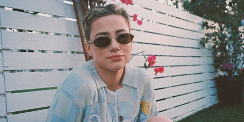 Lili Reinhart is seen wearing Miu Miu MU 54ZS 7OE5D1 sunglasses in her Instagram post