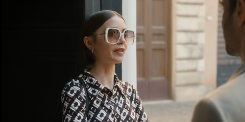 Lily Collins was seen wearing white Hugo Boss 1782/S SZJPR sunglasses with brown gradient lenses in Emily in Paris season 5, episode 2 as Emily Cooper.