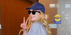 Lindsay Lohan was seen wearing the iconic Ray-Ban Wayfarer 2140 901 Black sunglasses at JFK airport in July 2025. Shop online now on Pretavoir