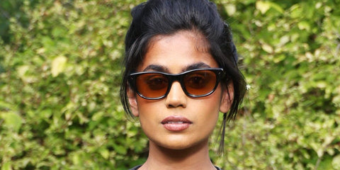 Danish actress Linnea Berthelsen was seen wearing black Prada PR C08S 16K10X sunglasses with brown to yellow gradient lenses at the Maison Hermes Bond Street opening party in London, June 2026.
