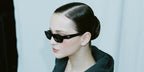 German actress Lisa Vicari was seen wearing black Prada PR B06S 16K08Z sunglasses at The Sound of Prada event in Berlin, June 2025.