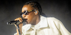 Rapper Little Simz was seen wearing black Bottega Veneta BV1442S 001 sunglasses onstage during day three of Coachella Music Festival 2026.