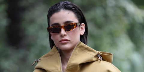 Brazilian model Livia Nunes was seen wearing brown tortoiseshell Gucci GG1779S 004 sunglasses at the Gucci Spring/Summer 2025 fashion show during Milan Fashion Week