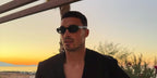 Footballer Lloyd Jones of Charlton Athletic FC was seen wearing black Prada PR B06S 16K08Z sunglasses in his Instagram post, October 2025.