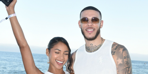 Lonzo Ball, pictured with Ally Rossel was seen wearing gold Cartier CT0468S 004 rimless sunglasses with brown gradient lenses at The h.wood Group's 10th annual red, white & bootsy 4th of July 2024 in Malibu