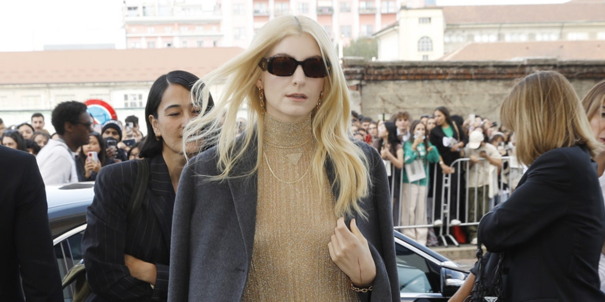 Lorde was seen wearing brown tortoiseshell Prada PR 17WS VAU2Z1 Symbole sunglasses to attend the Prada Spring/Summer 2023 fashion show during Milan Fashion Week