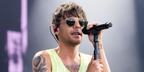 Louis Tomlinson was seen wearing gold Ray-Ban Jim RB 3694 001/31 sunglasses  at Sziget Festival 2024 in Budapest, Hungary. Shop online now on Pretavoir