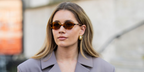 Swedish fashion influencer Lovisa Barkman was seen wearing tortoiseshell Miu Miu MU 04ZS 19P2Z1 oval sunglasses with brown lenses during Paris Fashion Week season Fall/Winter 2025. Shop online now on Pretavoir